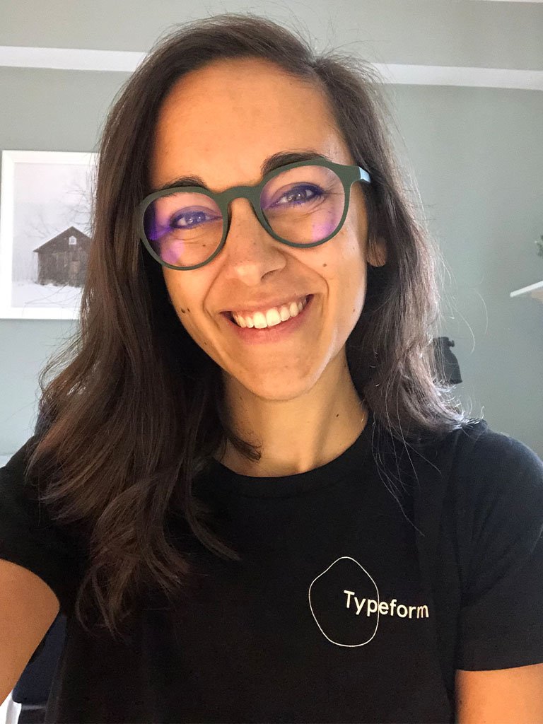 typeform employee wearing Barner blue light glasses